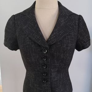 The limited skirt suit